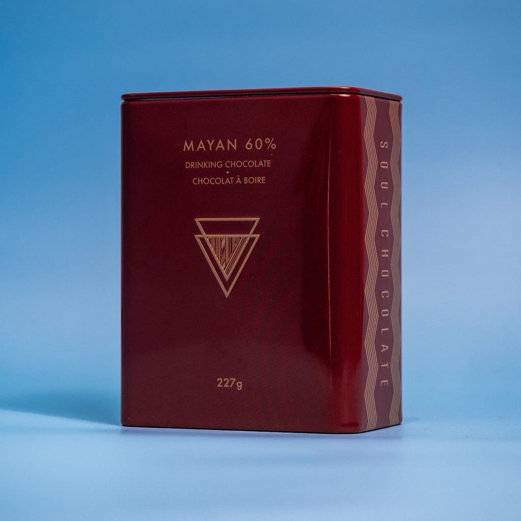 A red tin of Mayan organic hot cocoa mix