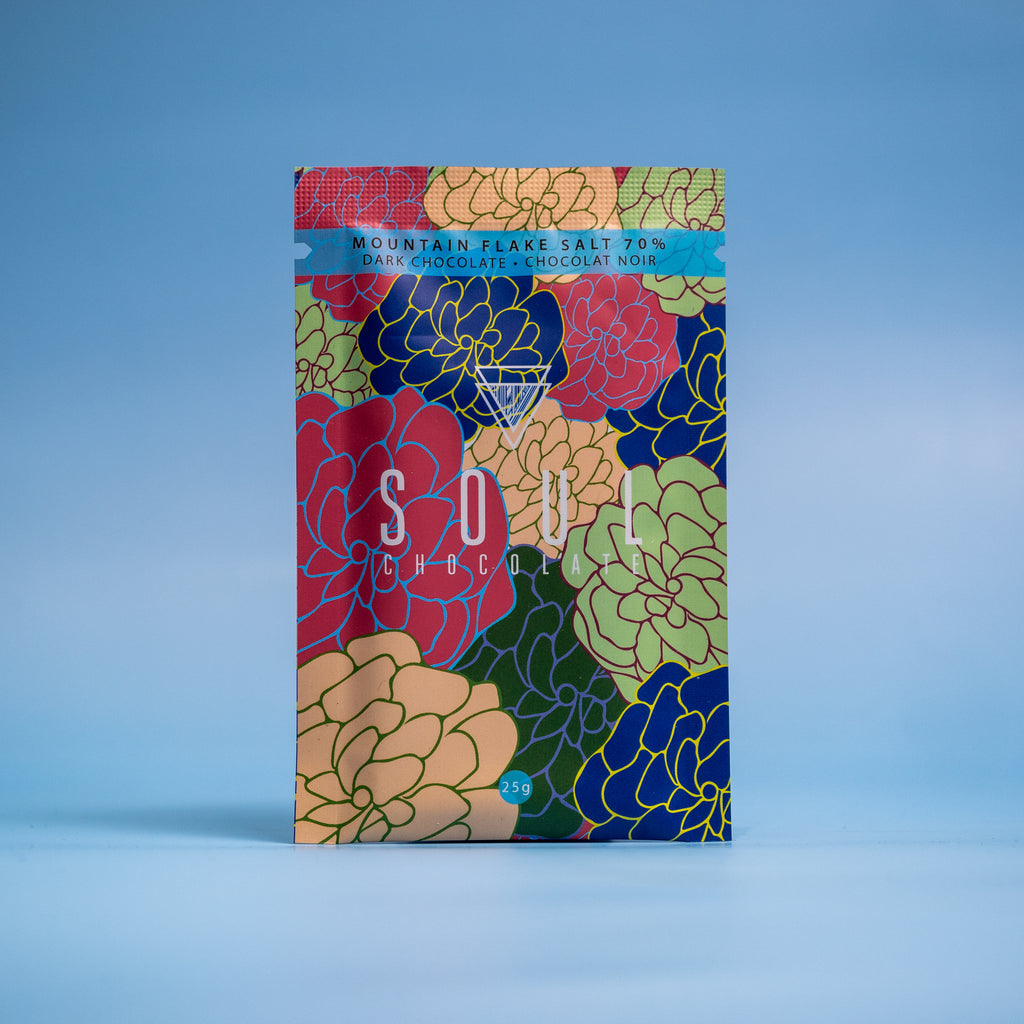 Organic dark chocolate bar with flake salt crystals - colourful bean to bar gourmet salted dark chocolate